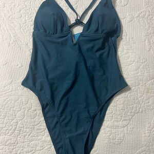 Sleek Blue One-Piece Swimsuit with Plunging Neckline